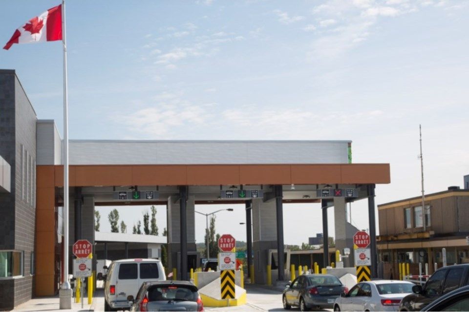 Border officials urge planning as holiday travel brings long weekend delays