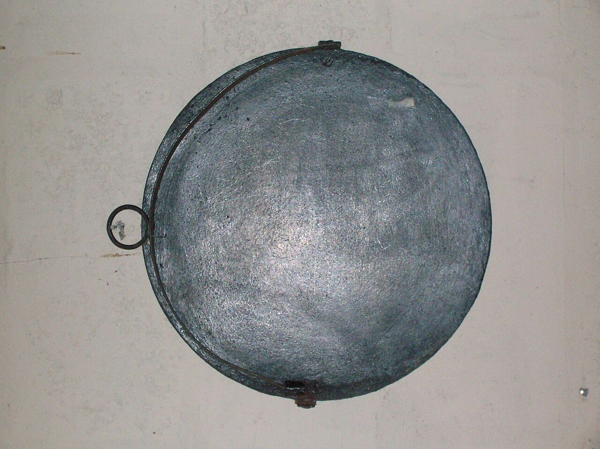 A girdle from Dalgarven Mill in North Ayrshire. Used for baking bannocks, oat cakes, etc.