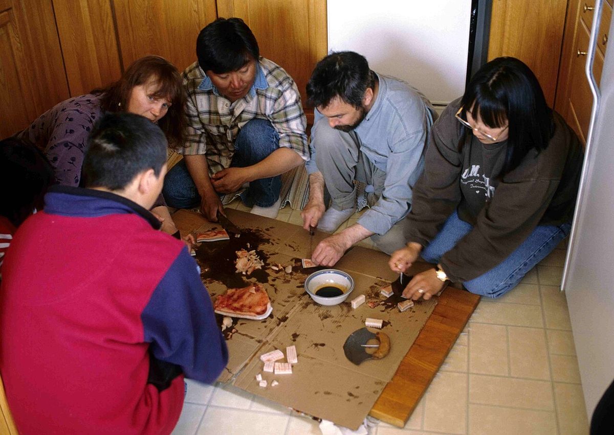 Maktaaq Feast to honour a young hunter for his first beluga whale catch