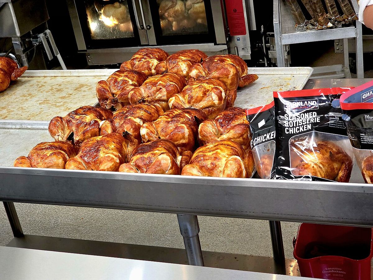 Rotisserie chickens being packaged at a Costco store in Citrus Heights, California. Photo by Jim Heaphy.