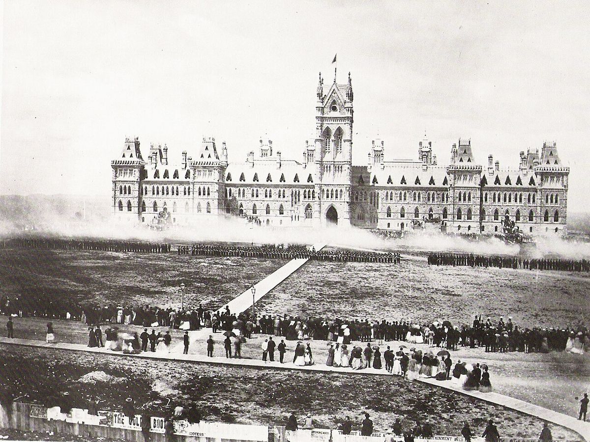 Troops deliver a "Feu-de-Joie" for the Queen's Birthday Review in front of Centre Block, Ottawa, Canada.