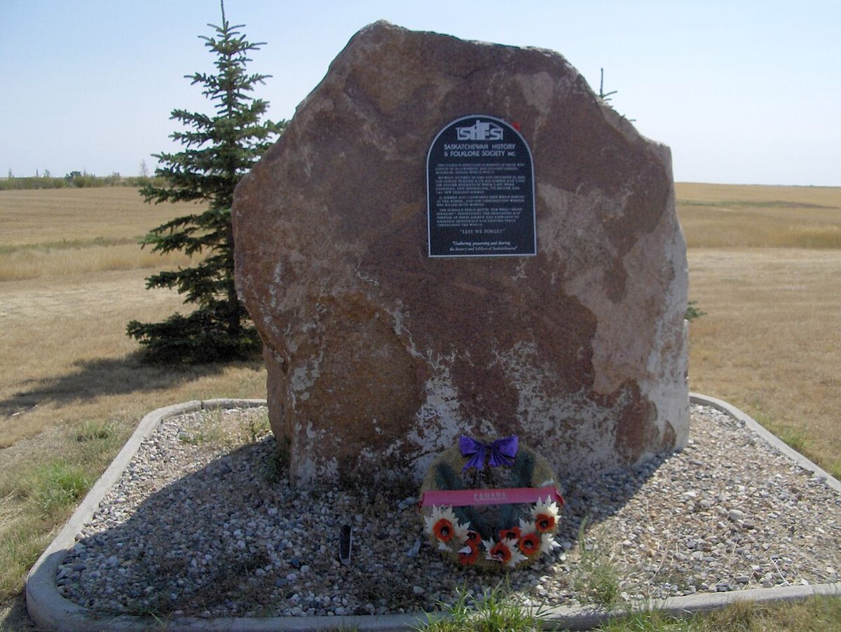 Cairn located on the edge of Highway 2, at the entrance of the former airbase near Mossbank, Sk.