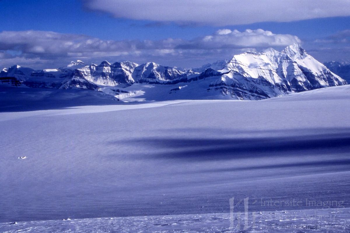 Columbia Icefield; Mt. Bryce right (hooking clouds), our lone tent left (with a wind break made of snow... see Mt. Columbia for one up close