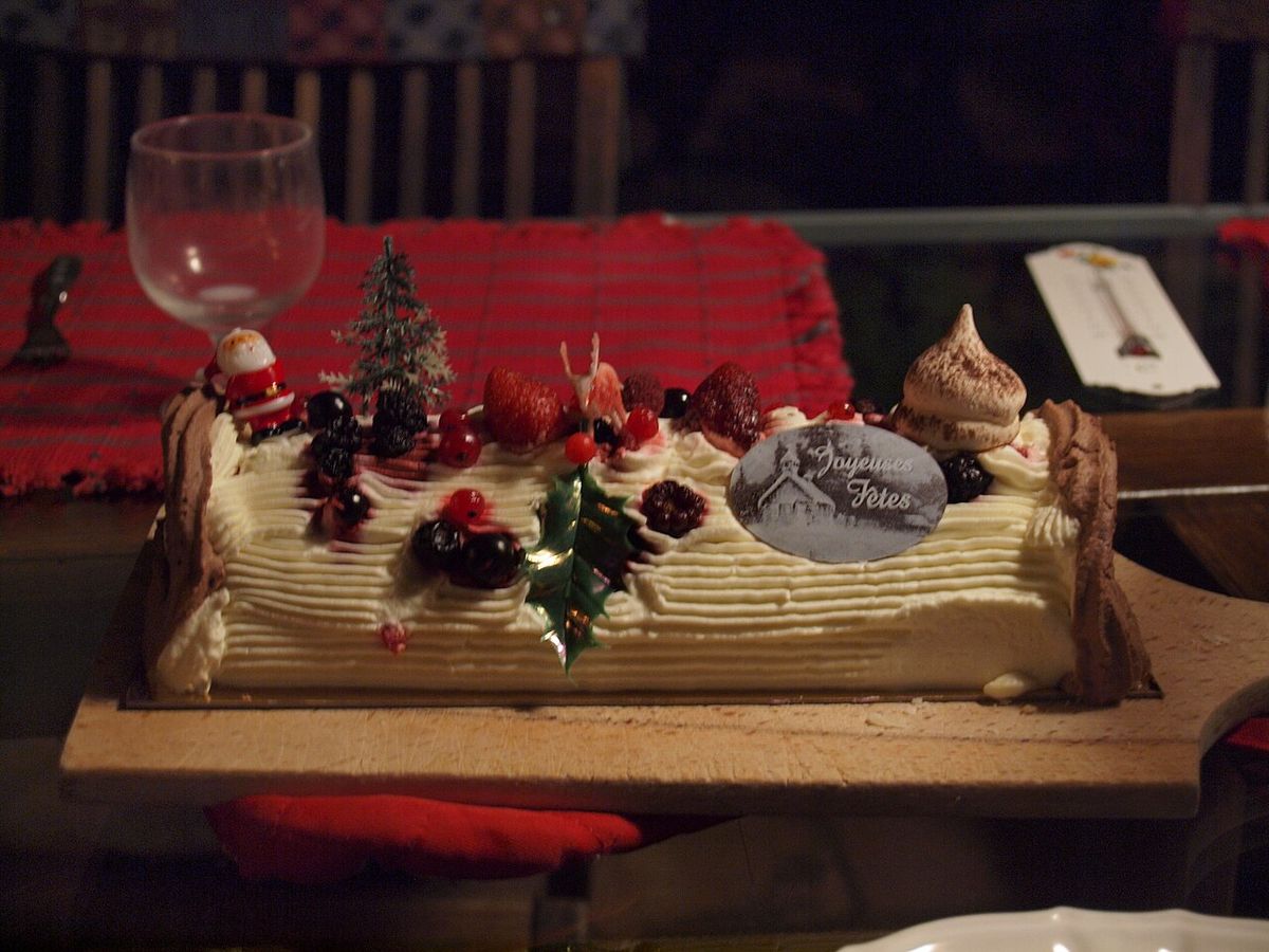 A traditional French bûche de Noël (Yule log cake) bought from a small bakery in Colomars, Alpes-Maritimes, France, served at a Christmas ev